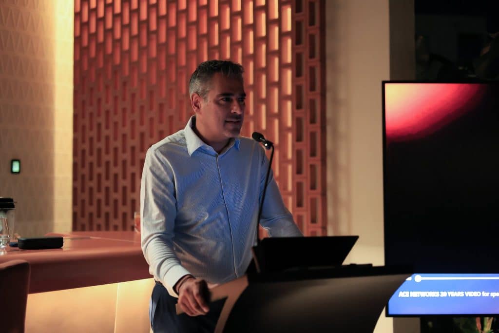 Andis Americanos, Director of ACE Networks, speaking at the 20th anniversary event